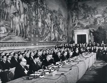Photo: Signing ceremony of the treaty at the Palazzo dei Conservatori, on Capitoline Hill, Rome. Source: https://en.wikipedia.org/wiki/Treaty_of_Rome#/media/File:Treaty_of_Rome.jpg.